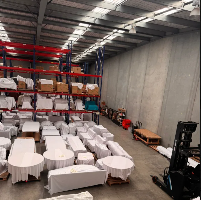Protected furniture and joinery staged in warehouse for confidential Tier One construction project