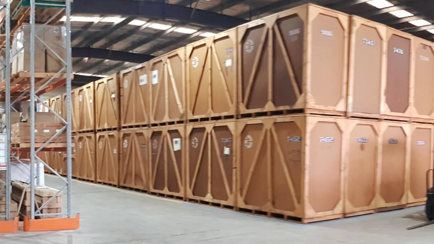 Specific warehouse crates and forklift supporting staged hotel delivery